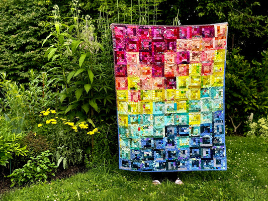 Scrappy log cabin quilt